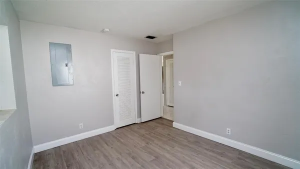 a view of a room with racks on the wall
