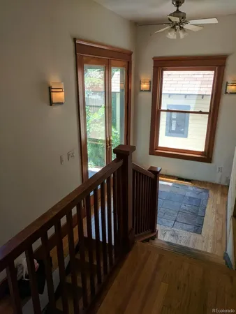 a view of a hallway with a window