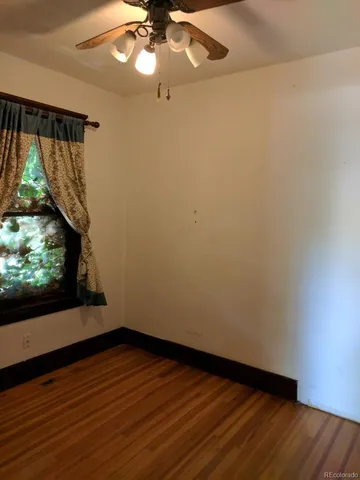 a bench sitting in front of a building