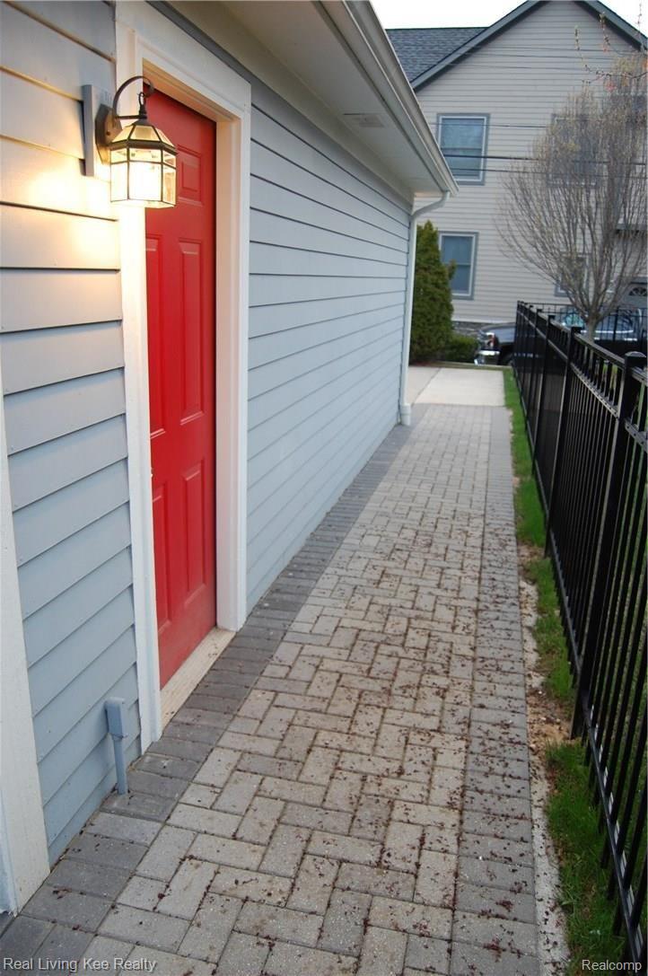 305 Taylor Avenue Rochester, MI 48307 - Photo 51 of 55 GARAGE SIDE ENTRANCE STAIRS TO LOFT
