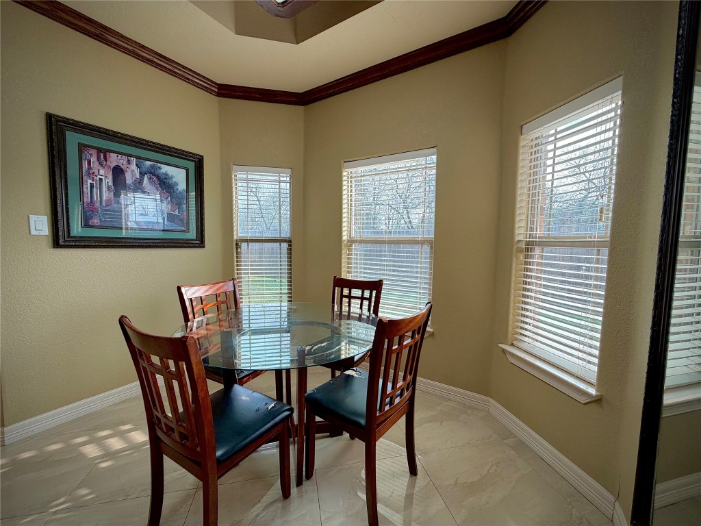 3741 Debbie Lane Groves, TX 77619 - Photo 6 of 16 a view of a dining room with furniture and window