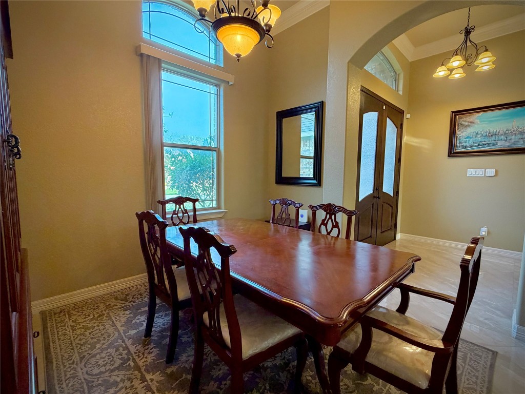 3741 Debbie Lane Groves, TX 77619 - Photo 7 of 16 a view of a dining room with furniture
