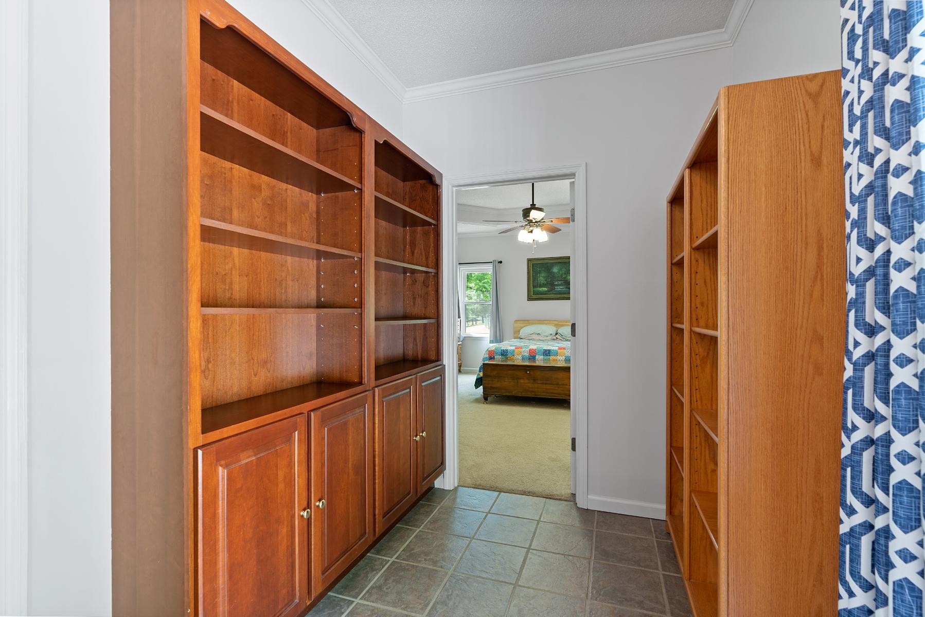 28 Spring Valley Road Taft, TN 38488 - Photo 21 of 55 a view of walk in closet and bedroom