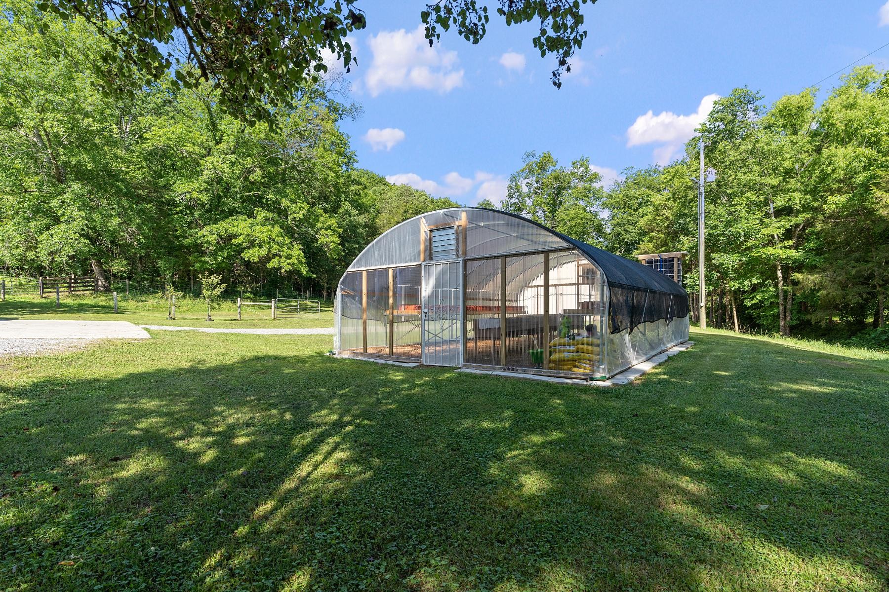 28 Spring Valley Road Taft, TN 38488 - Photo 40 of 55 a view of a house with a yard