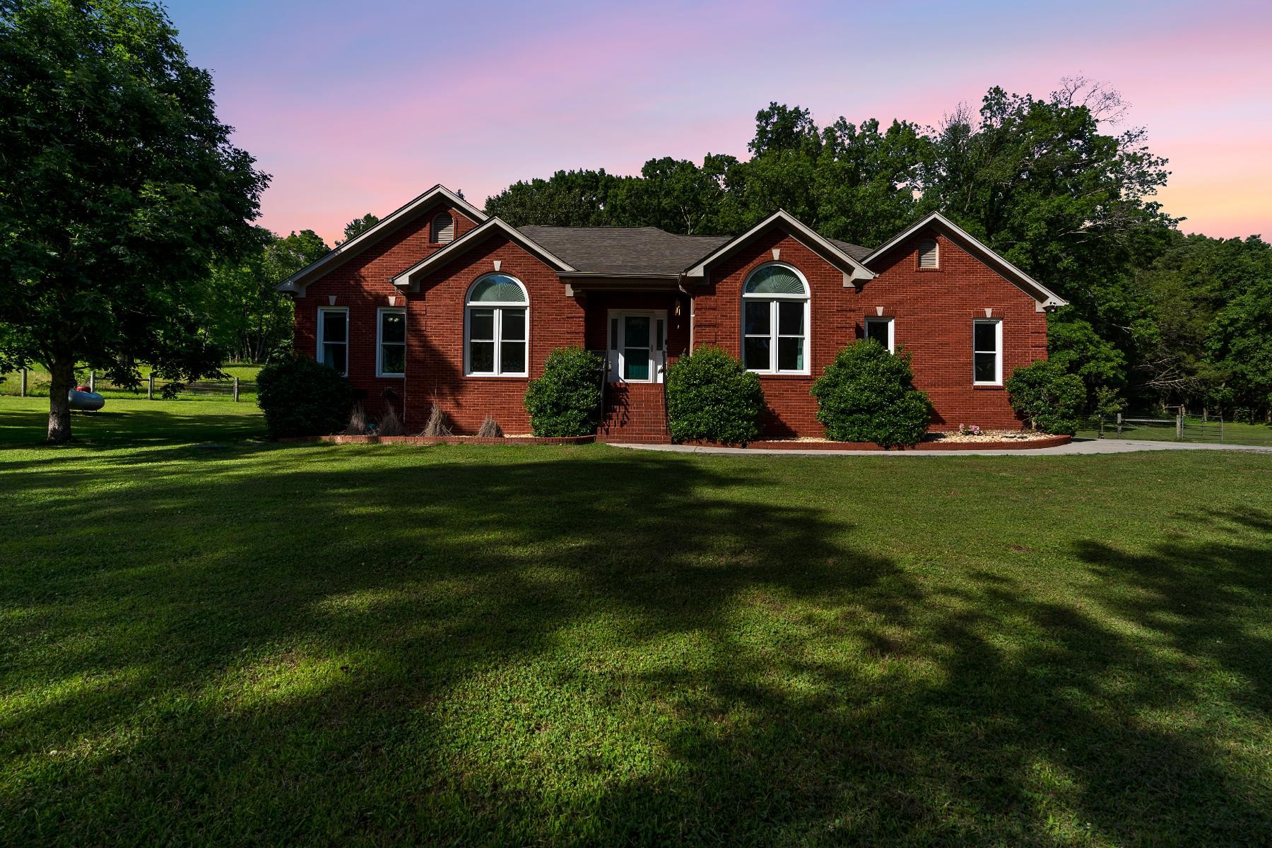 28 Spring Valley Road Taft, TN 38488 - Photo 8 of 55 a front view of a house with a yard