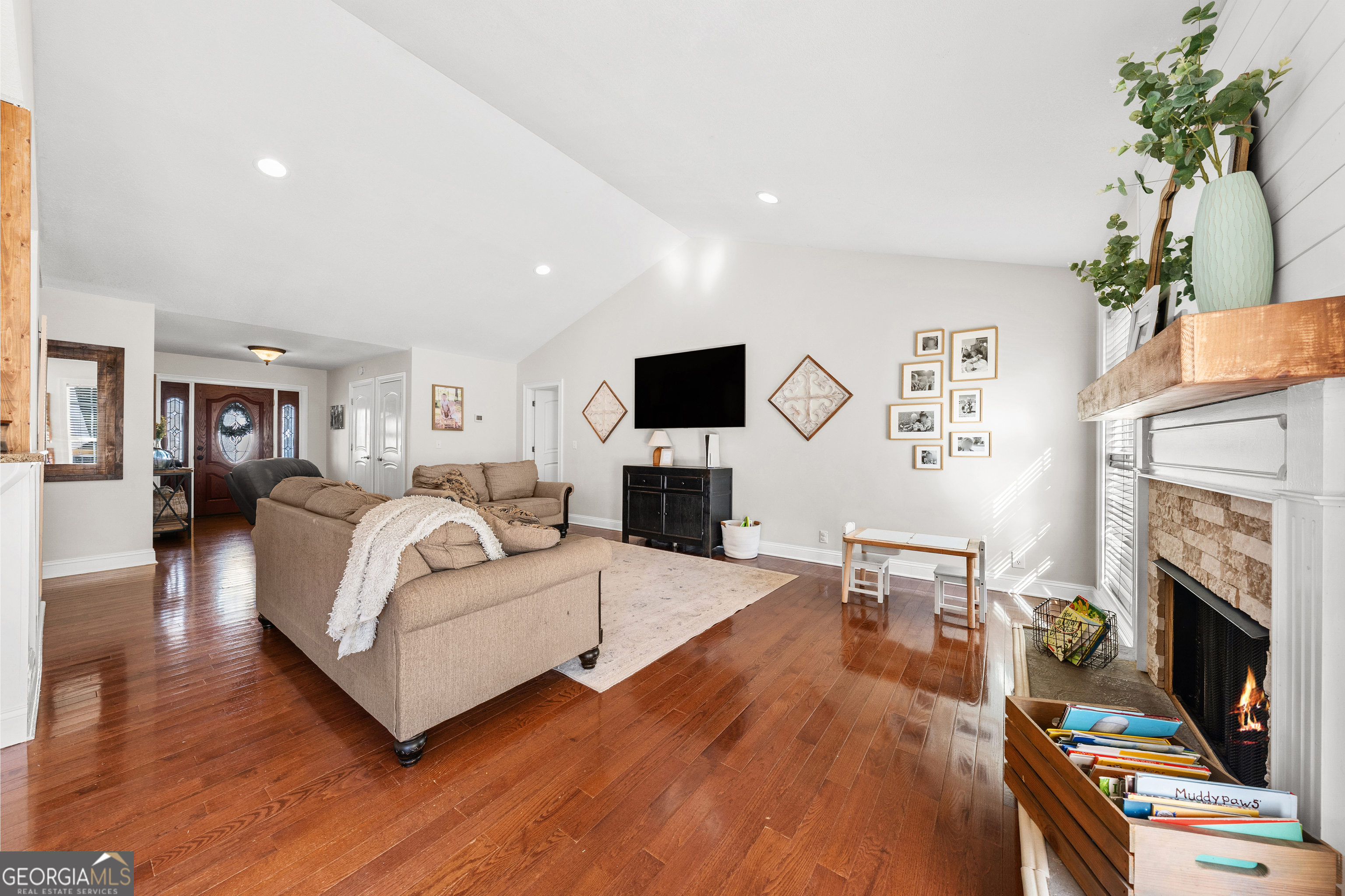 175 Highland Ridge Drive Hartwell, GA 30643 - Photo 12 of 46 a living room with furniture fireplace and flat screen tv