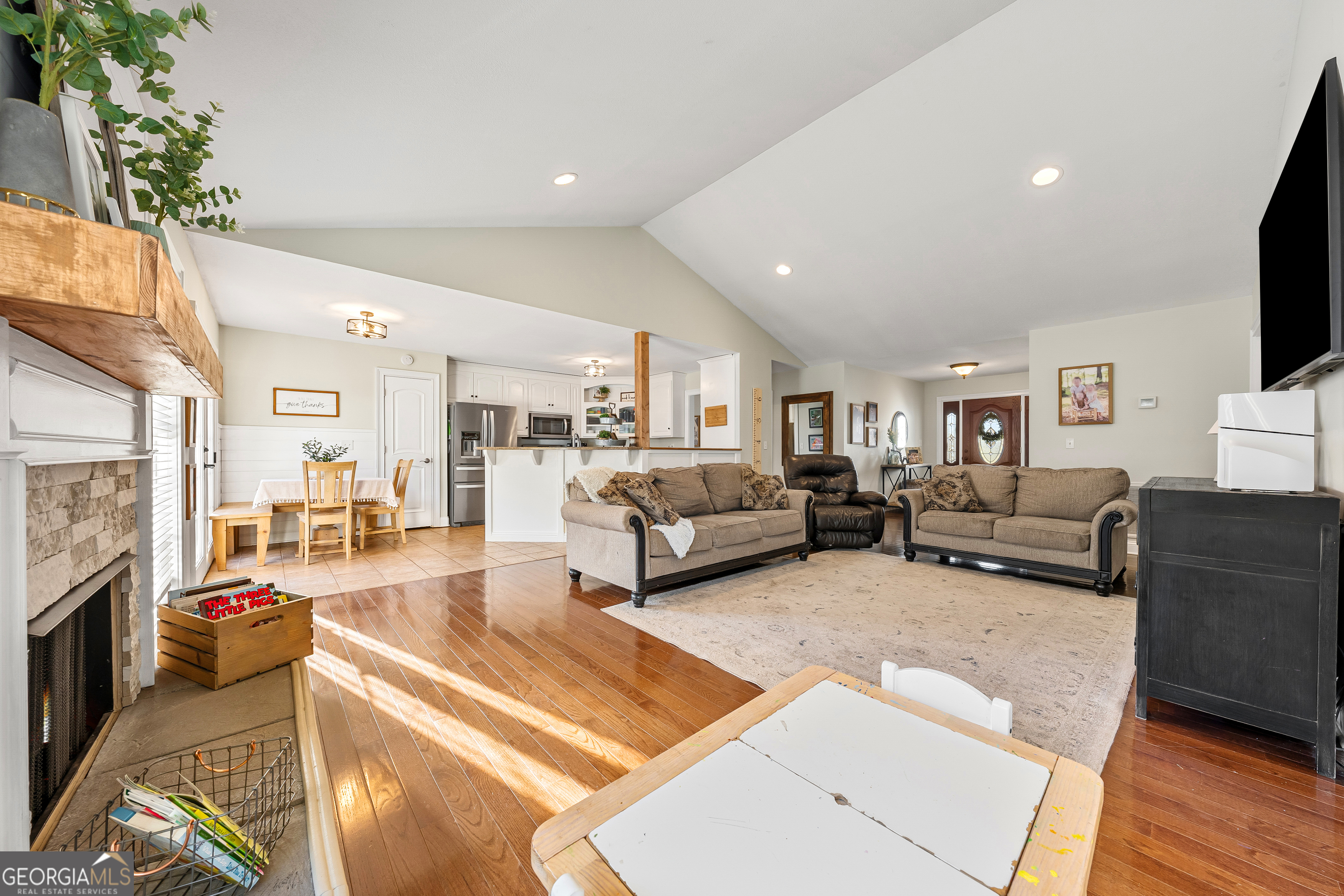 175 Highland Ridge Drive Hartwell, GA 30643 - Photo 13 of 46 a living room with furniture and a fireplace