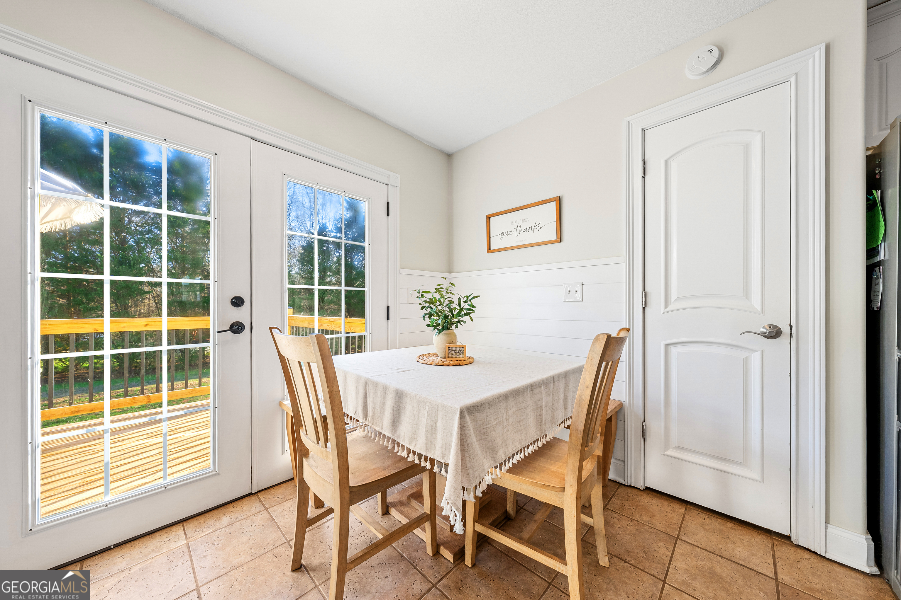 175 Highland Ridge Drive Hartwell, GA 30643 - Photo 17 of 46 a view of a dining room with furniture and windows