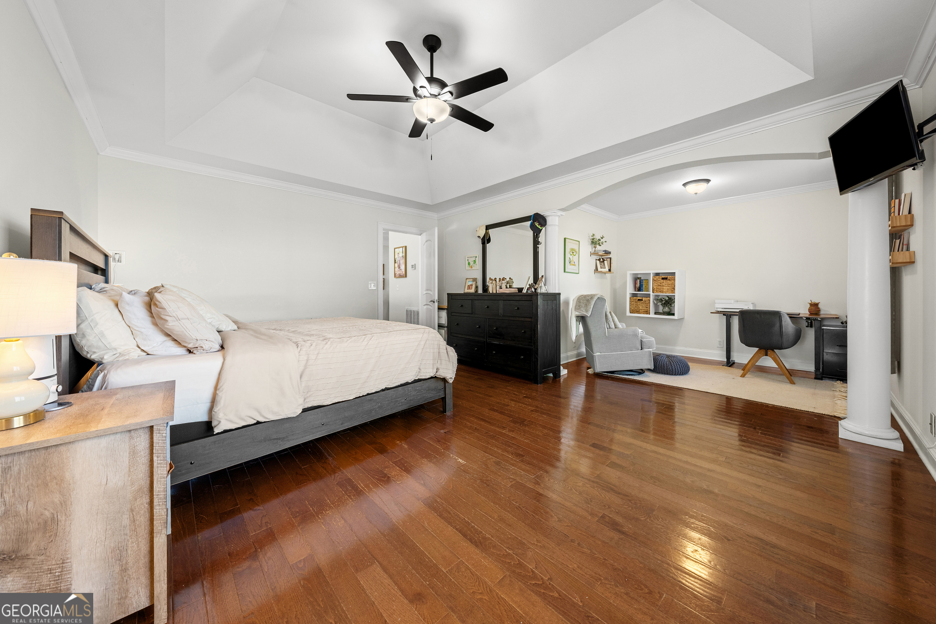 175 Highland Ridge Drive Hartwell, GA 30643 - Photo 19 of 46 a bedroom with a bed and wooden floor