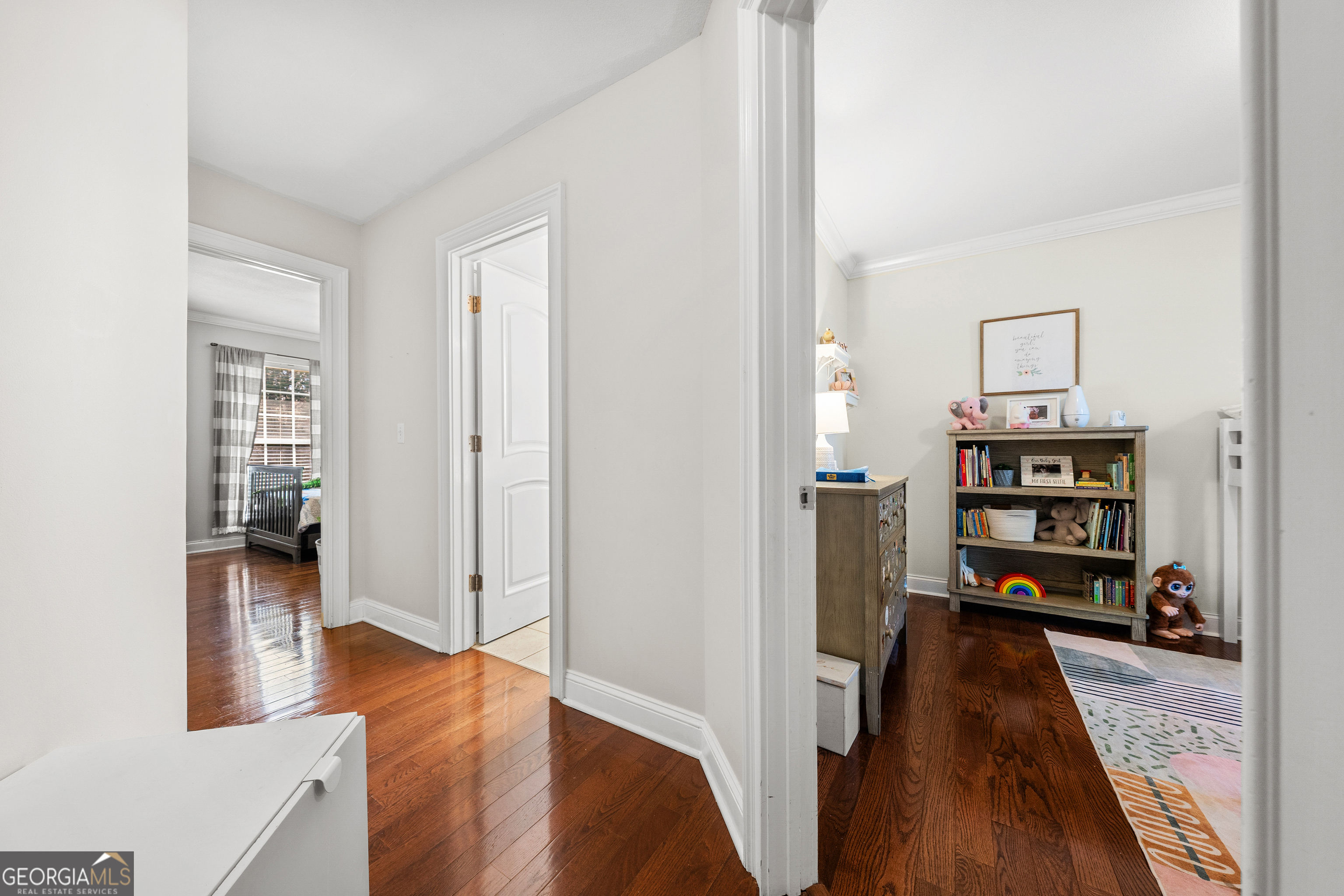 175 Highland Ridge Drive Hartwell, GA 30643 - Photo 27 of 46 a view of a hallway with wooden floor and furniture