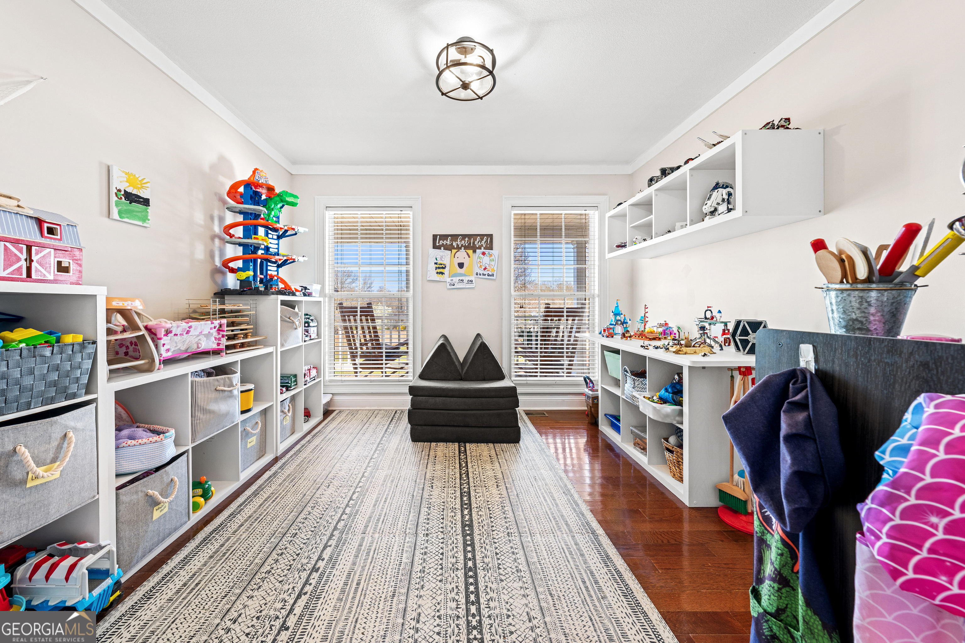 175 Highland Ridge Drive Hartwell, GA 30643 - Photo 28 of 46 a living room with furniture and a book shelf