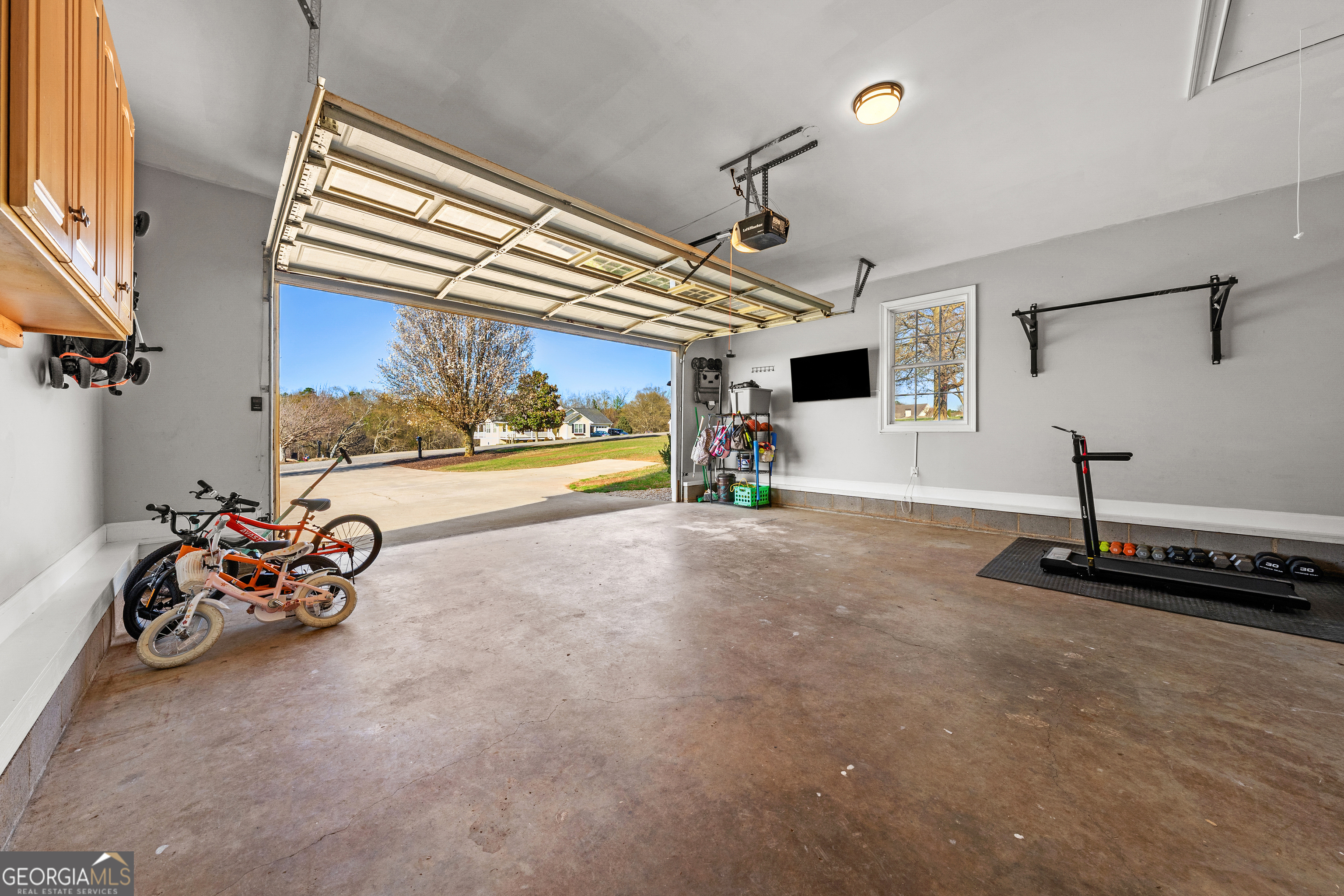 175 Highland Ridge Drive Hartwell, GA 30643 - Photo 34 of 46 a view of a room with gym equipment