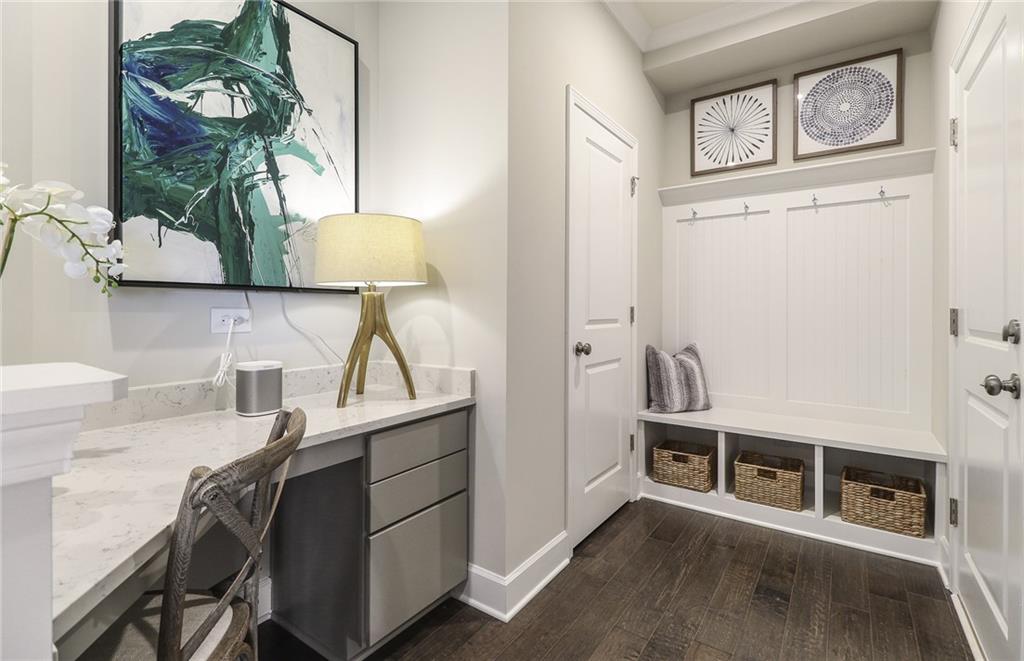 4397 Azalea Ridge Way Hoschton, GA 30548 - Photo 17 of 41 a living room with furniture and a wooden floor