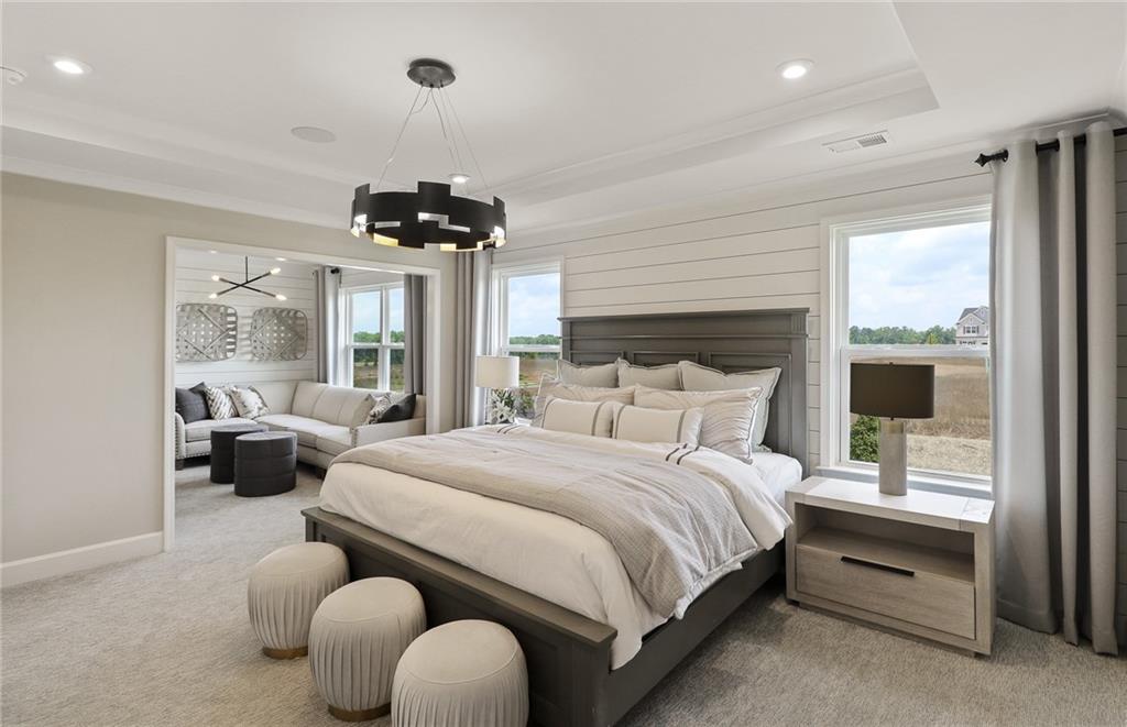 4397 Azalea Ridge Way Hoschton, GA 30548 - Photo 32 of 41 a bedroom with bed and a window