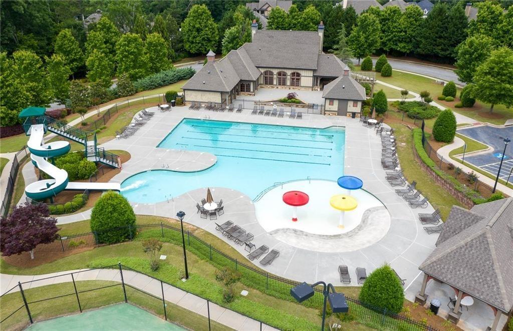 4397 Azalea Ridge Way Hoschton, GA 30548 - Photo 37 of 41 a view of a table and chairs in the patio