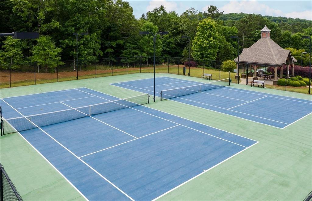 4397 Azalea Ridge Way Hoschton, GA 30548 - Photo 40 of 41 a view of an outdoor space with tennis court