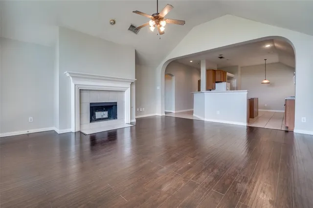 a living room with couches and a fireplace