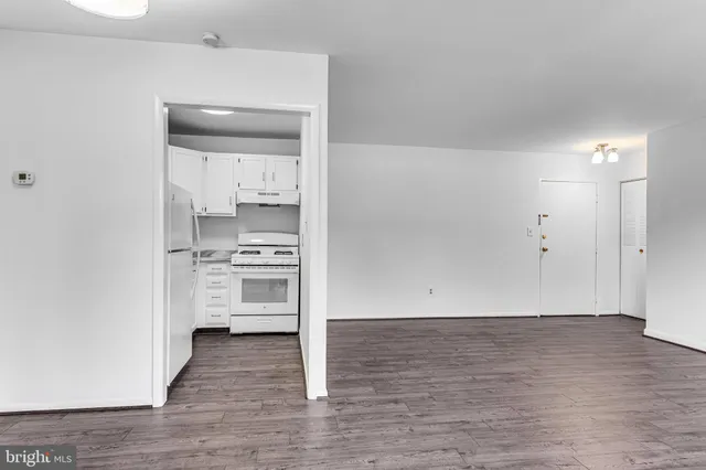 a view of kitchen with wooden floor