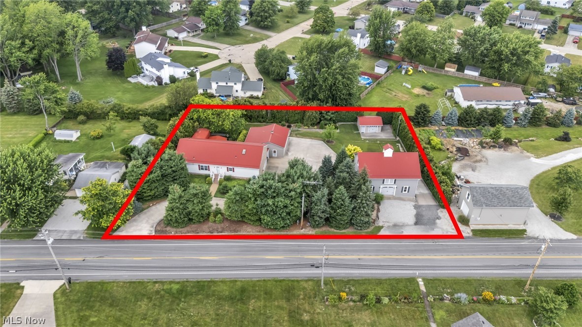 45002 Middle Ridge Road Amherst, OH 44001 - Photo 1 of 48 Aerial view of residential area with property parcel outlined