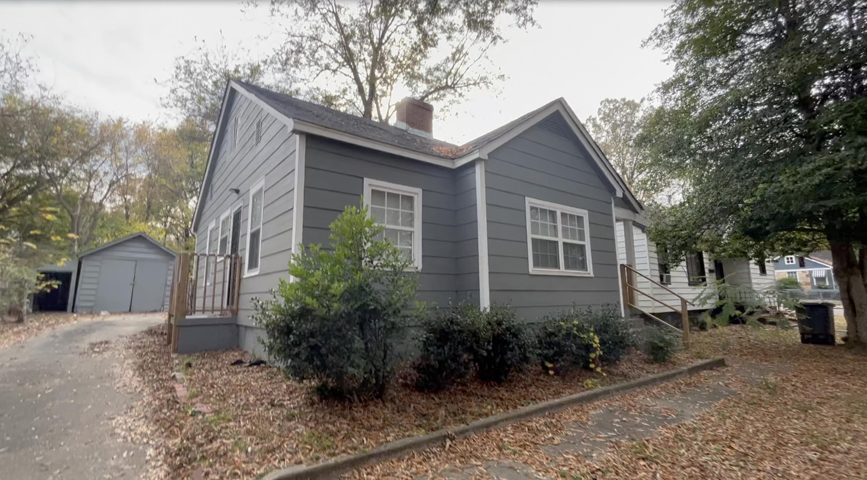 3347 Carrington Road Memphis, TN 38111 - Photo 1 of 3 a front view of a house with garden