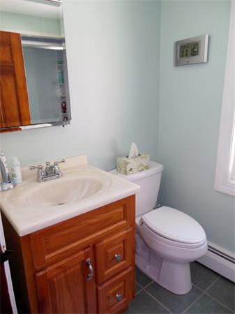 22 Esty Road Princeton, MA 01541 - Photo 13 of 25 a bathroom with a sink toilet and mirror