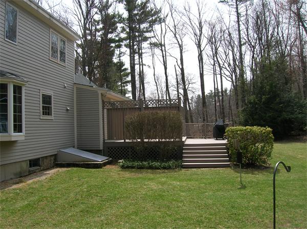 22 Esty Road Princeton, MA 01541 - Photo 21 of 25 a backyard of a house with seating space