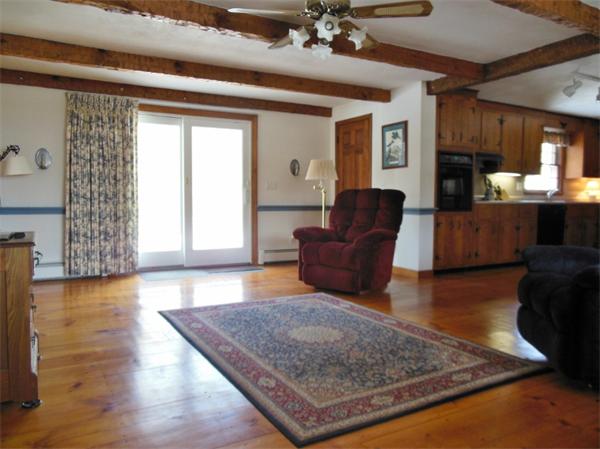 22 Esty Road Princeton, MA 01541 - Photo 3 of 25 a living room with furniture and a wooden floor