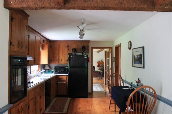 22 Esty Road Princeton, MA 01541 - Photo 6 of 25 a kitchen with stainless steel appliances granite countertop a refrigerator a stove top oven a sink and dishwasher