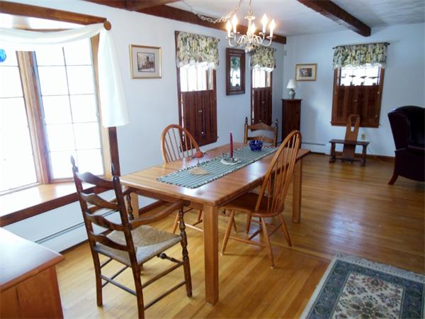 22 Esty Road Princeton, MA 01541 - Photo 7 of 25 a view of a dining room with furniture and a chandelier