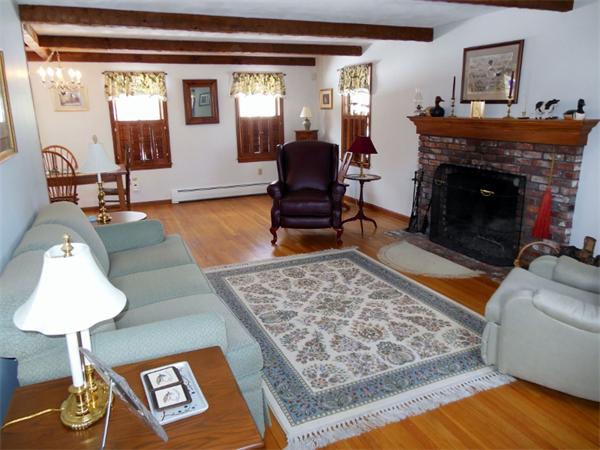 22 Esty Road Princeton, MA 01541 - Photo 9 of 25 a living room with furniture and a fireplace