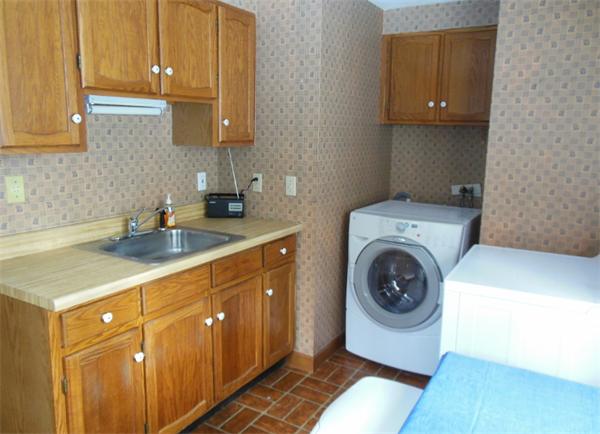 22 Esty Road Princeton, MA 01541 - Photo 10 of 25 a utility room with sink dryer and washer