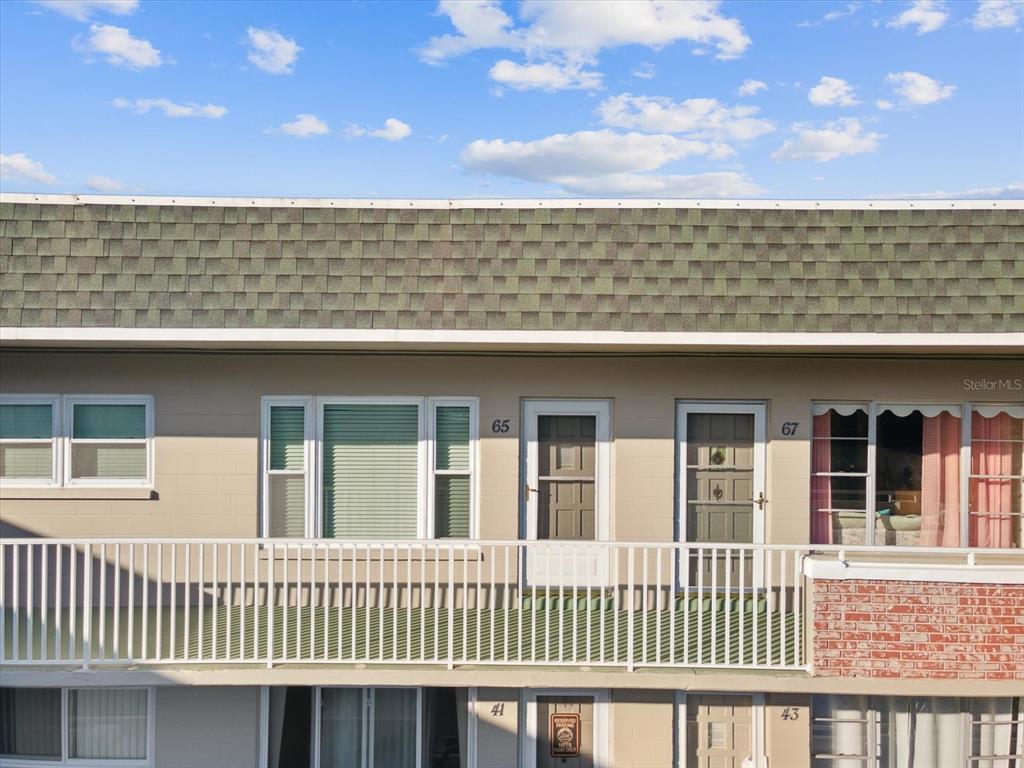 a view of a building from a balcony