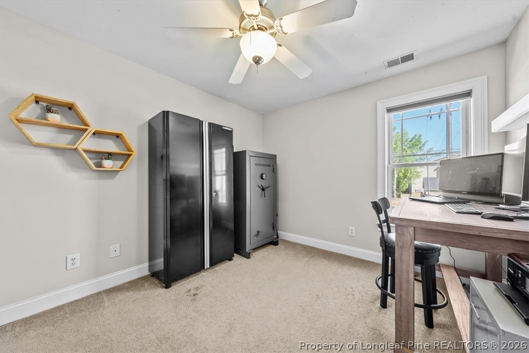 2708 Plum Ridge Road Fayetteville, NC 28306 - Photo 20 of 27 a view of a workspace with furniture