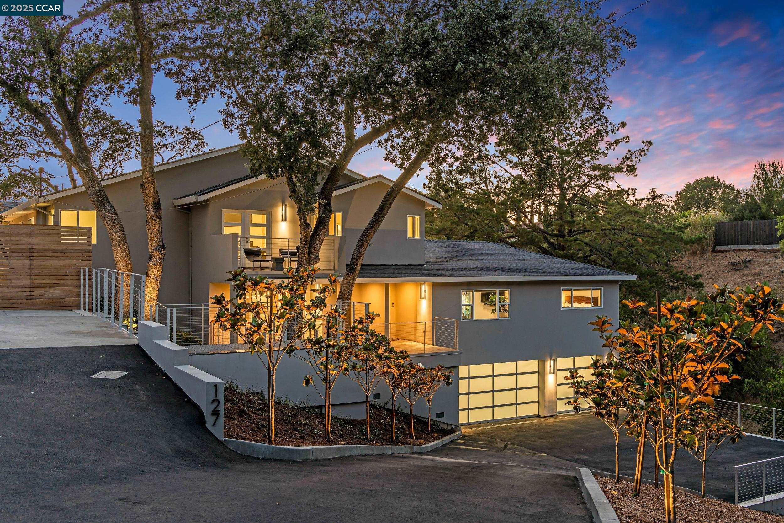 127 Caminar Way Walnut Creek, CA 94596 - Photo 1 of 60 a front view of a house with a tree
