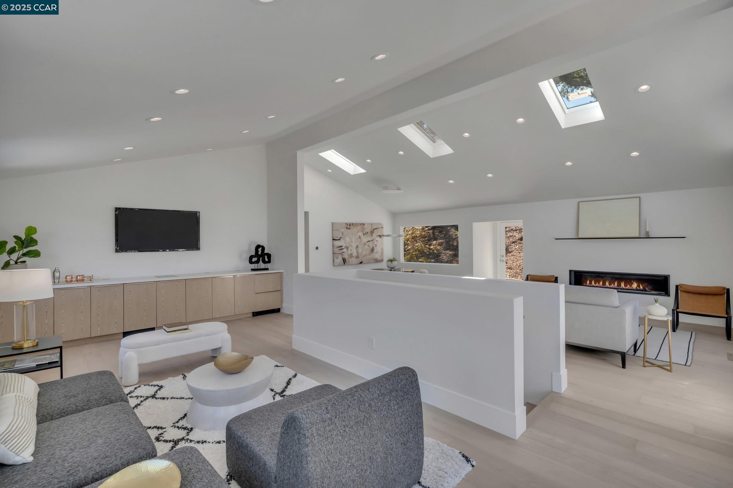 127 Caminar Way Walnut Creek, CA 94596 - Photo 20 of 60 a living room with furniture and a flat screen tv