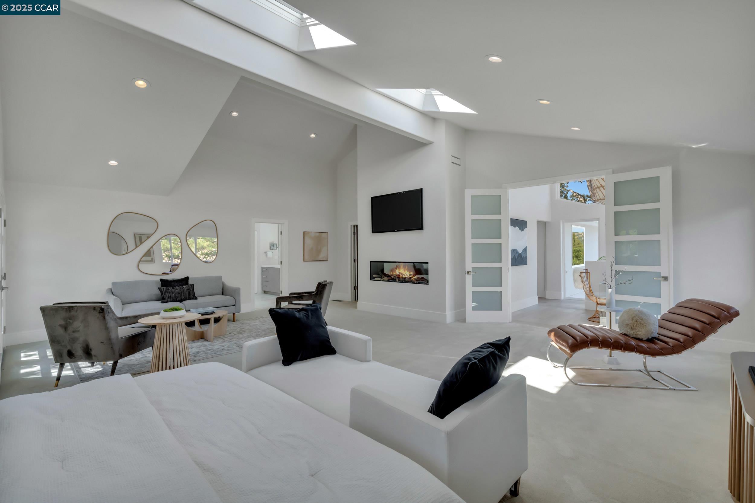 127 Caminar Way Walnut Creek, CA 94596 - Photo 23 of 60 a living room with furniture and a flat screen tv