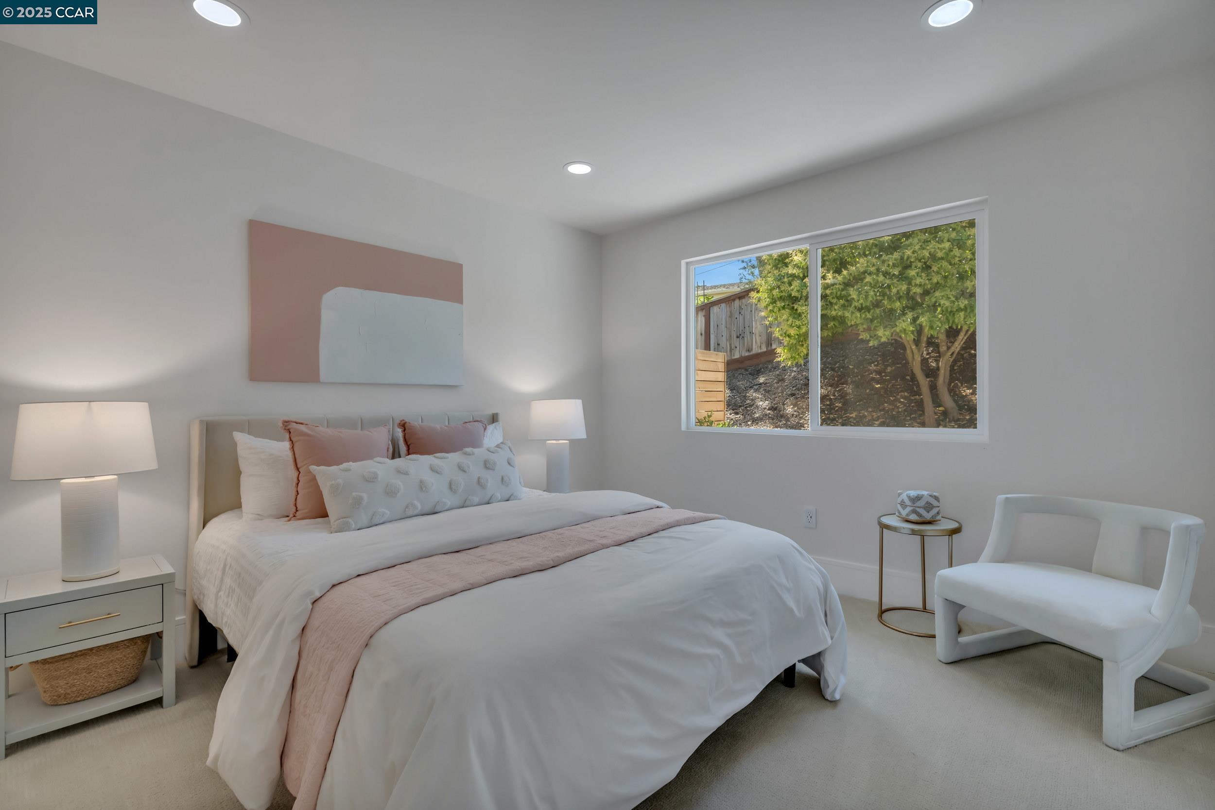 127 Caminar Way Walnut Creek, CA 94596 - Photo 32 of 60 a bedroom with bed and a couch