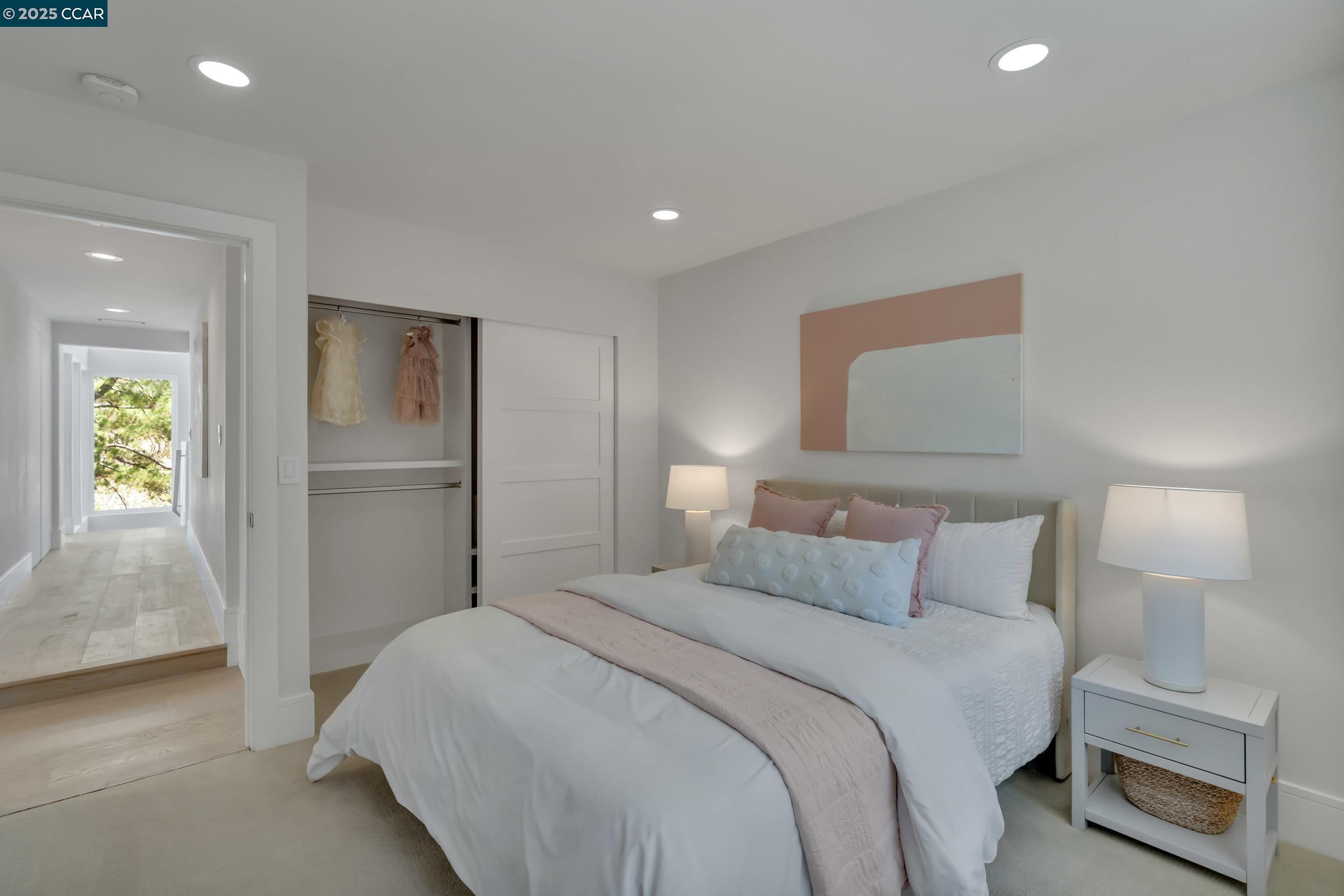 127 Caminar Way Walnut Creek, CA 94596 - Photo 33 of 60 a bedroom with a bed and a lamp