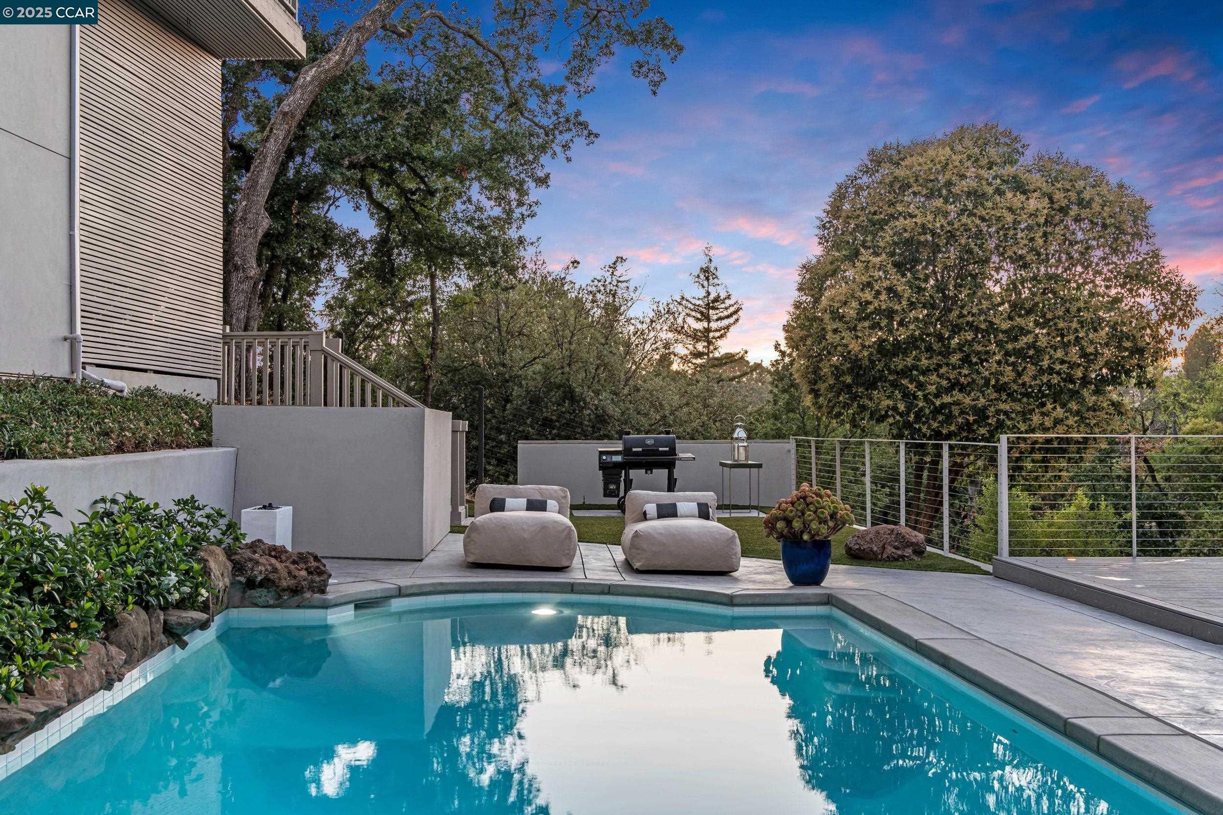 127 Caminar Way Walnut Creek, CA 94596 - Photo 47 of 60 a view of a patio with chairs next to a yard