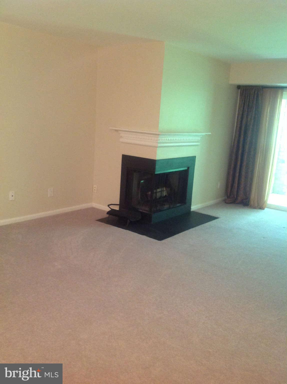 5827 Cove Landing Road, Unit 303 Burke, VA 22015 - Photo 2 of 16 Living Room