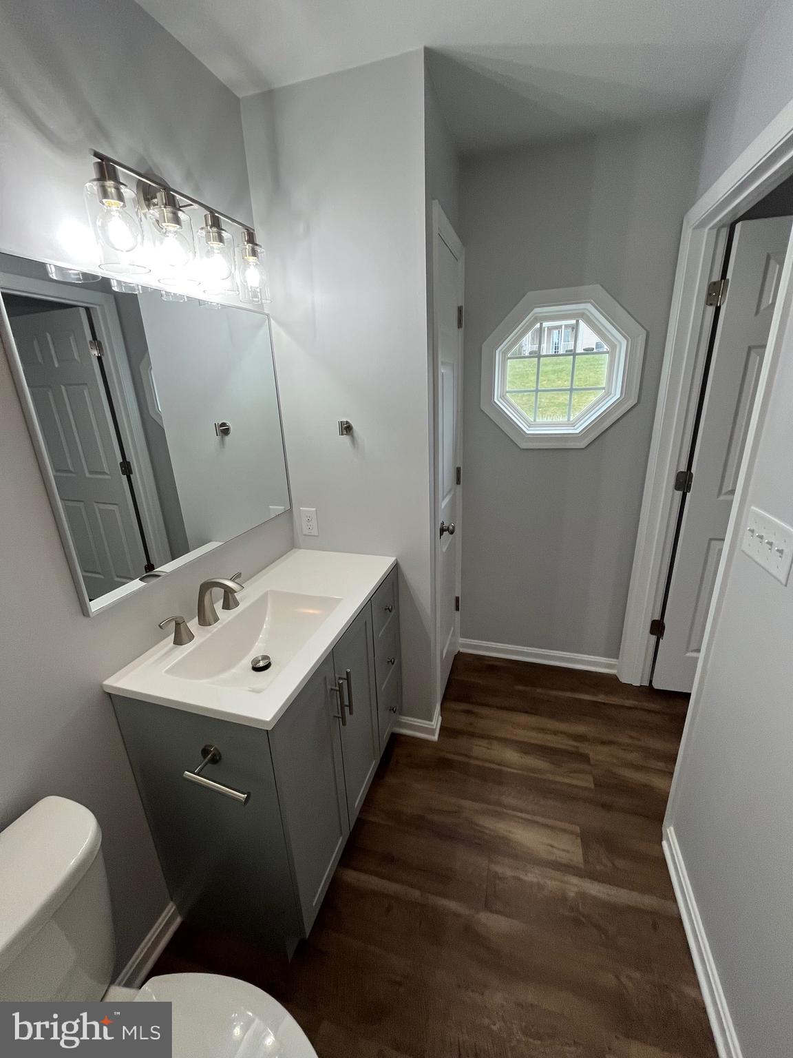 3077 Lakefield Road, Unit 3077 York, PA 17402 - Photo 20 of 33 a bathroom with sink and mirror