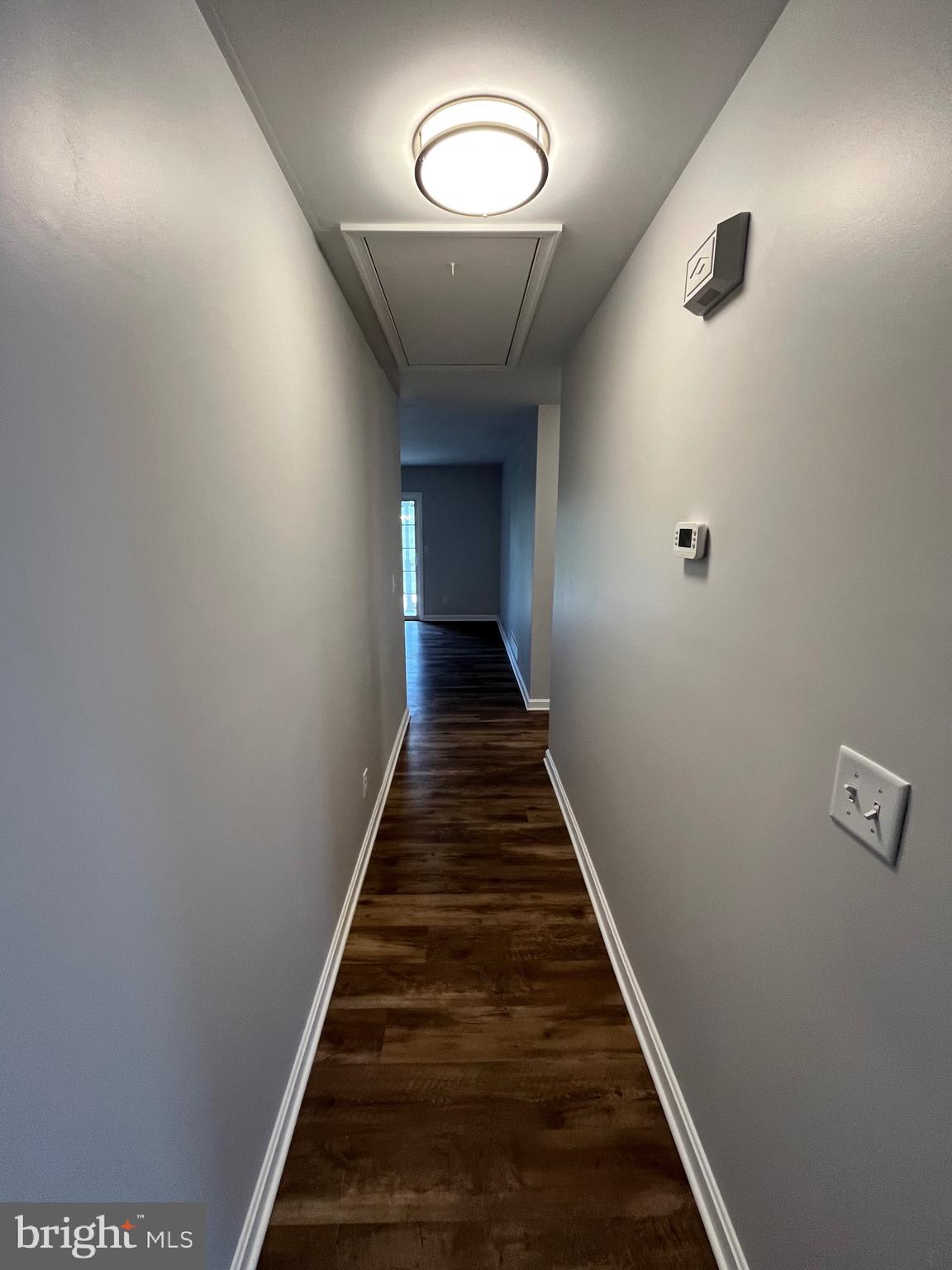 3077 Lakefield Road, Unit 3077 York, PA 17402 - Photo 22 of 33 a view of a hallway with wooden floor and entryway