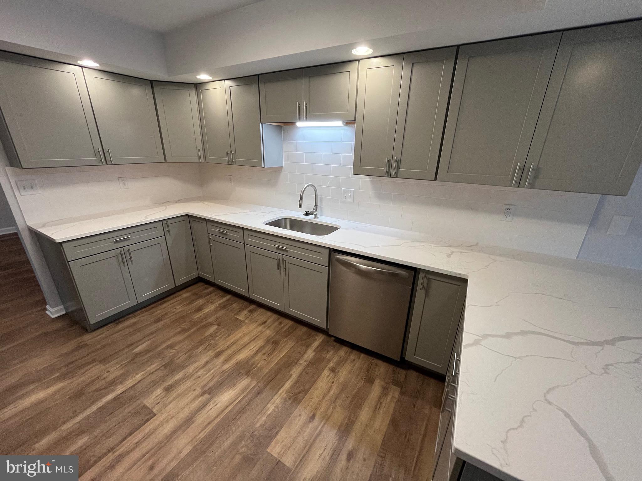 3077 Lakefield Road, Unit 3077 York, PA 17402 - Photo 4 of 33 a kitchen with sink and cabinets