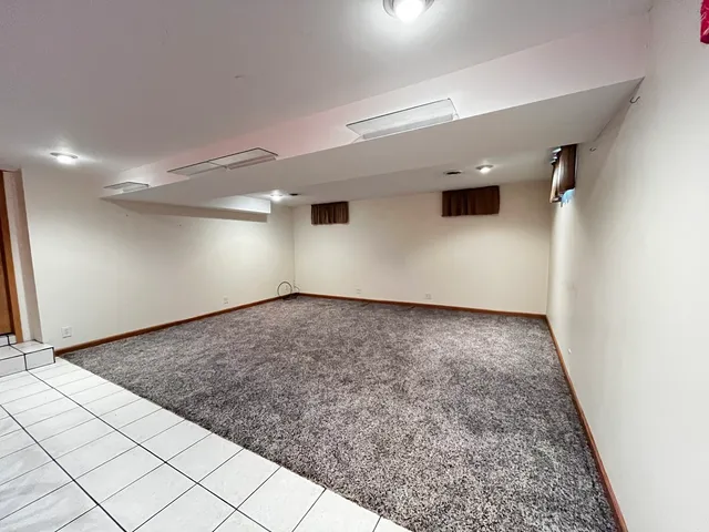 an empty room with natural light