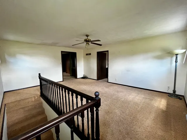 a view of a hallway with entryway