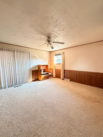 a view of a livingroom with furniture