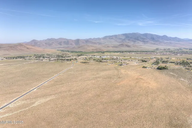a view of an ocean and mountain