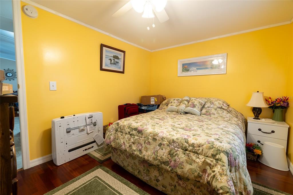 591 Marshburn Drive Bronson, FL 32621 - Photo 43 of 69 a bed sitting in a bedroom next to a window