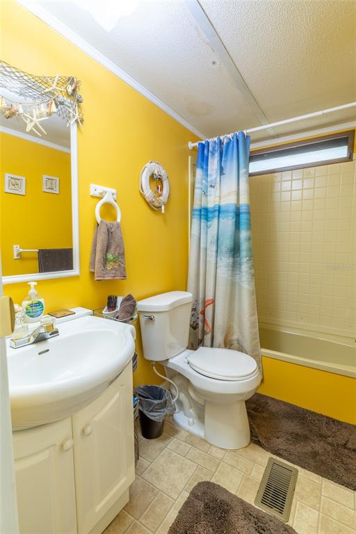 591 Marshburn Drive Bronson, FL 32621 - Photo 44 of 69 a bathroom with a sink toilet and shower