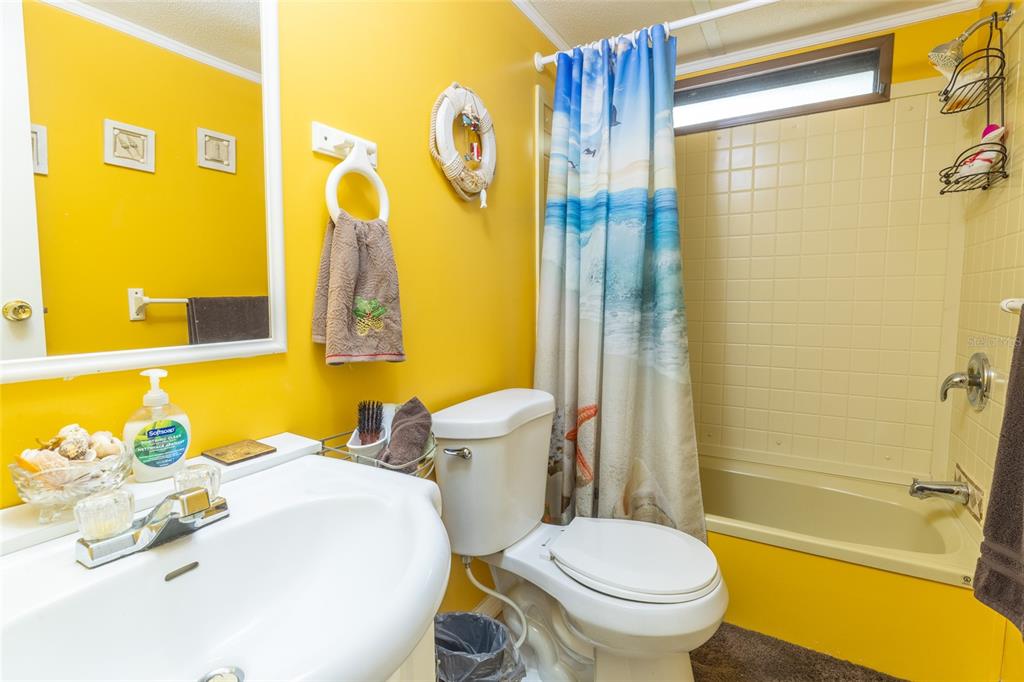 591 Marshburn Drive Bronson, FL 32621 - Photo 45 of 69 a bathroom with a sink and a mirror